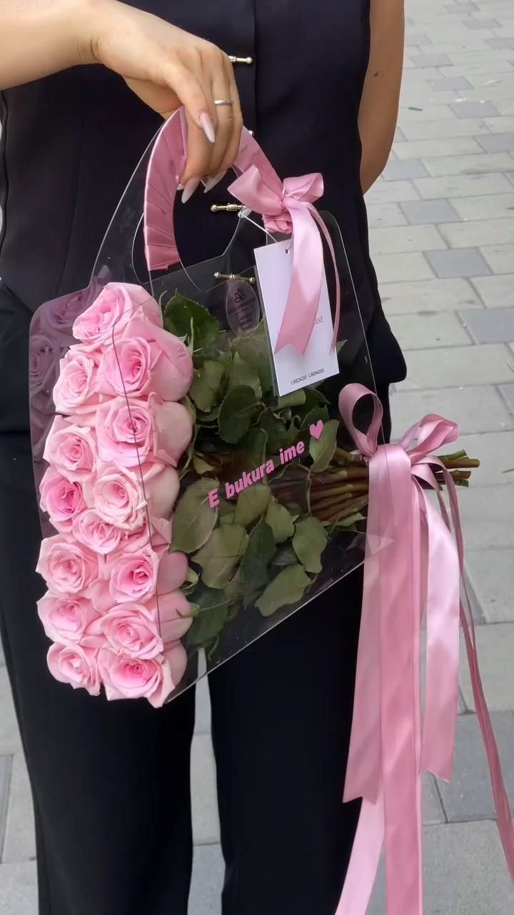 Florist designing a beautiful custom flower arrangement